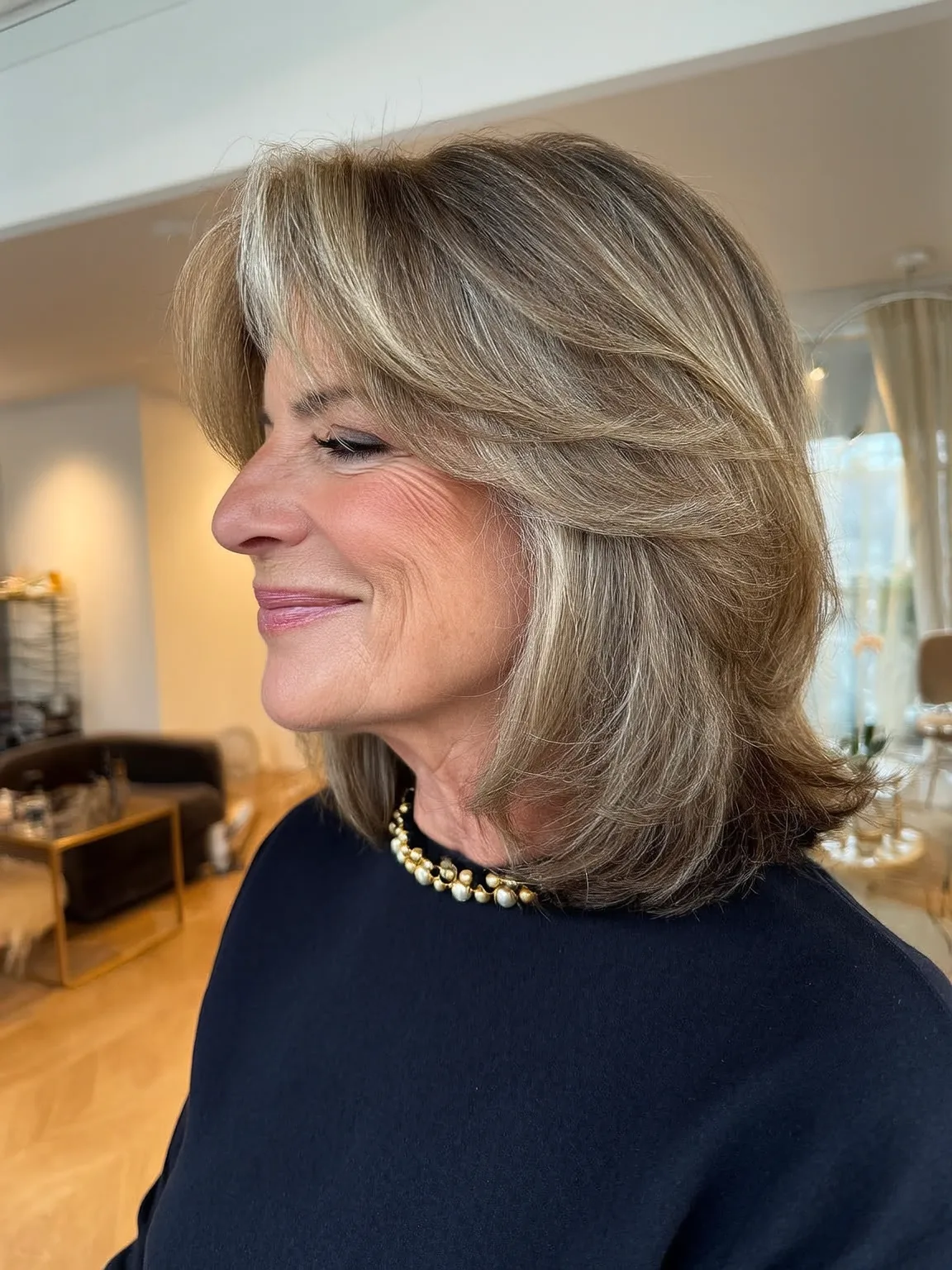 Soft Ash Bronde Wavy Feathered Layers with Curtain Bangs